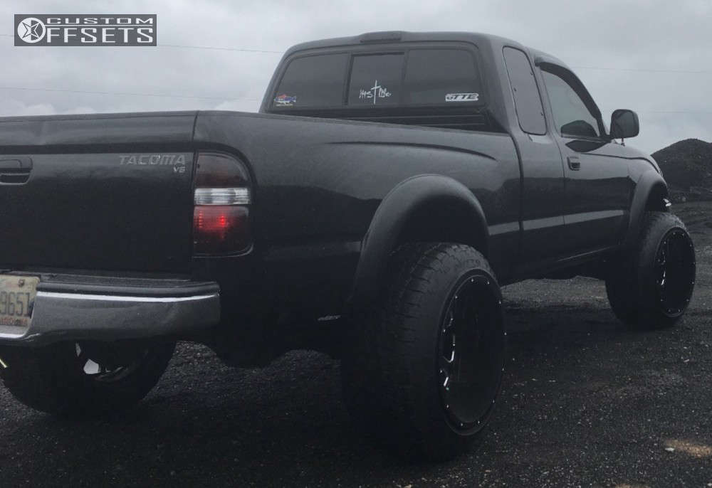 2003 Toyota with 20x14 76 XD Xd825 and 285/55R20 Nitto Terra