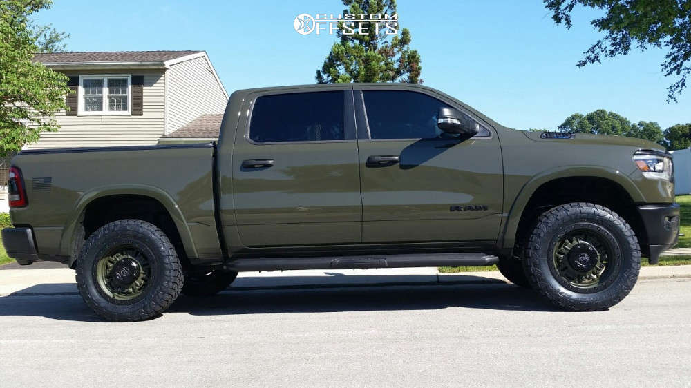 2021 Ram 1500 with 20x9.5 12 Black Rhino Abrams and 295/60R20 Toyo Tires Open Country A/T III
