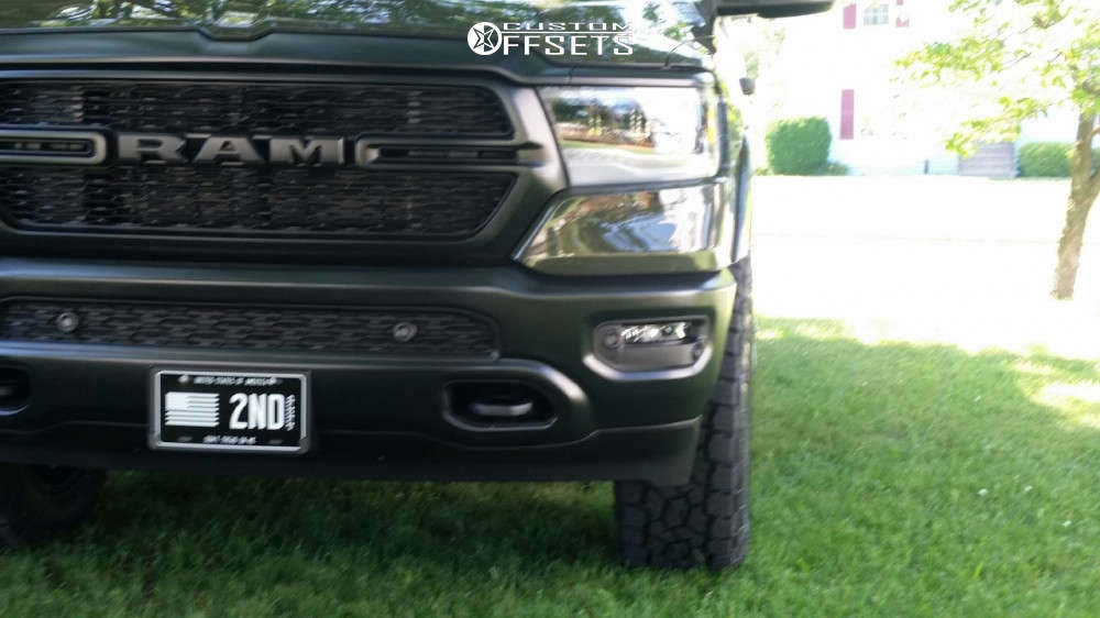 2021 Ram 1500 with 20x9.5 -12 Black Rhino Abrams and 295/60R20 Toyo ...
