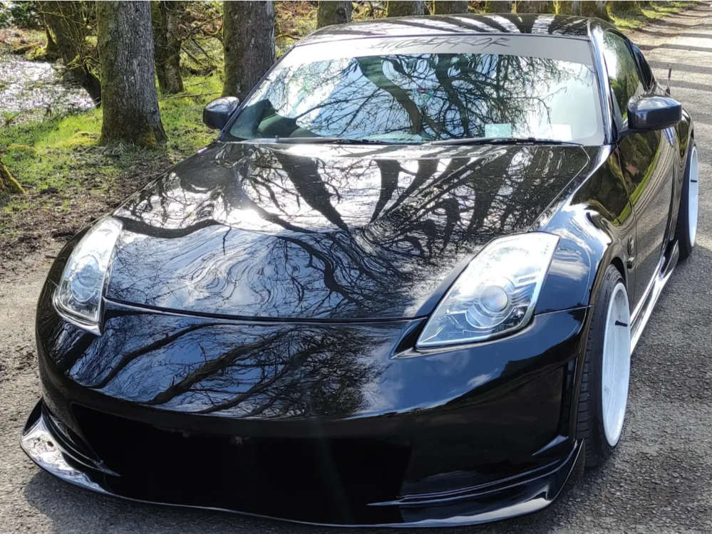 2008 Nissan 350Z with 18x9 30 Cosmis Racing Xt-006r and 225/40R18