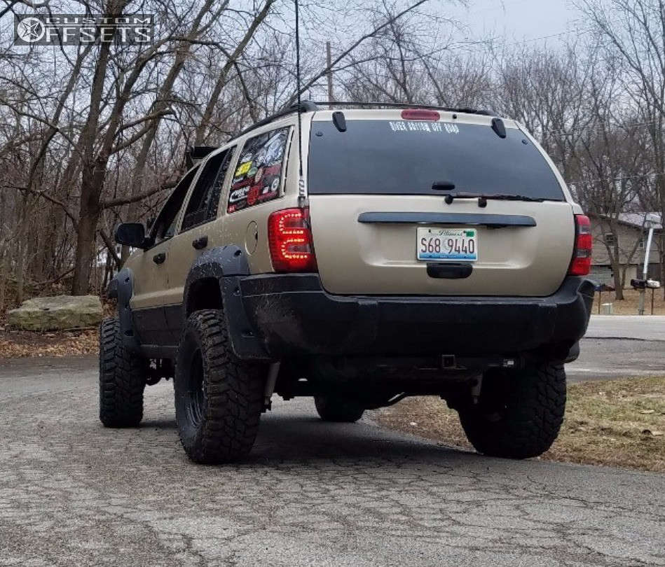 2001 Jeep Grand Cherokee with 16x8 12 Vision D Window and 305/70R16