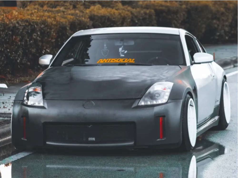 2006 Nissan 350Z with 18x11 8 Cosmis Racing Xt-206r and 245/35R18 ...