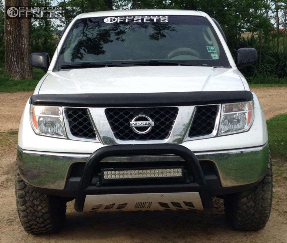 2008 Nissan Frontier with 16x8 -6 American Outlaw Buckshot and 285 ...