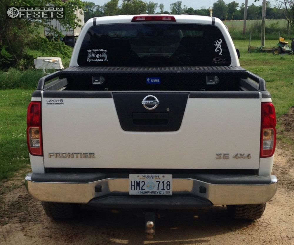 2008 Nissan Frontier with 16x8 -6 American Outlaw Buckshot and 285 ...