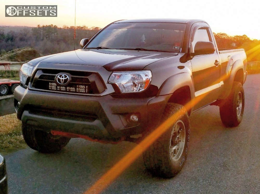 2014 Toyota with 16x8.5 6 Level 8 Guardian and 265/75R16 Toyo