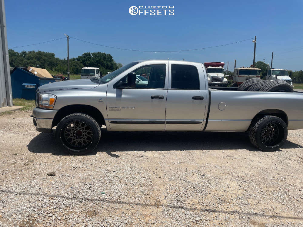 2006 Dodge Ram 2500 with 22x12 -55 Vision Rocker and 305/40R22 General ...