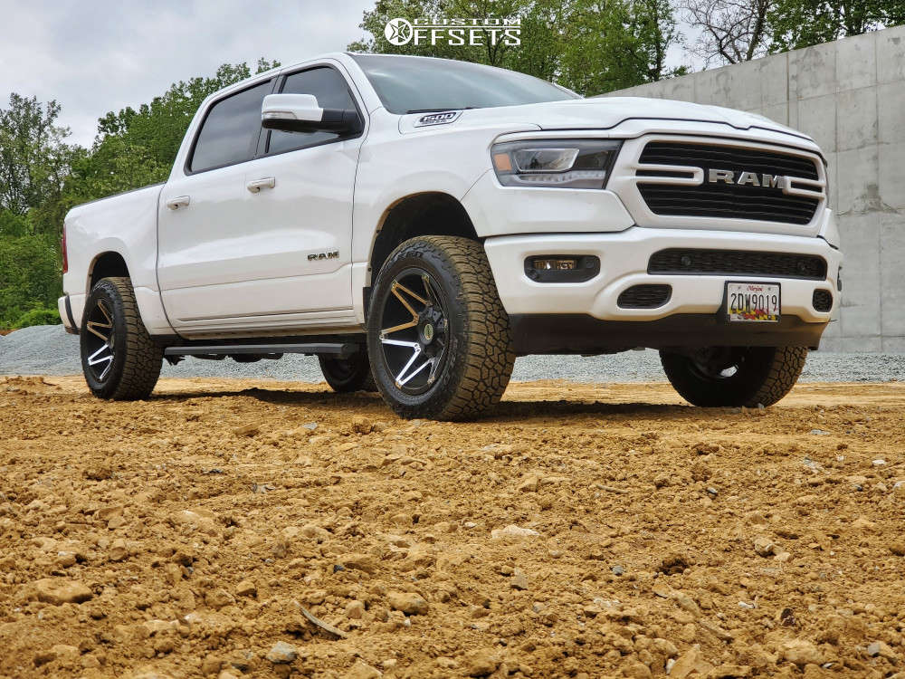 2019 Ram 1500 with 20x10 -25 Toxic Shok and 275/60R20 Falken WildPeak ...