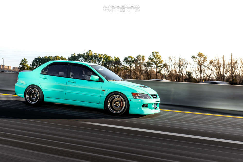 2003 Mitsubishi Lancer with 17x9.5 18 Enkei Rpf1 and 245/45R17