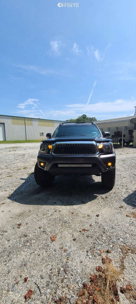 2012 Toyota Tacoma with 20x12 -44 Ballistic Rage 959 and 275/65R20 ...