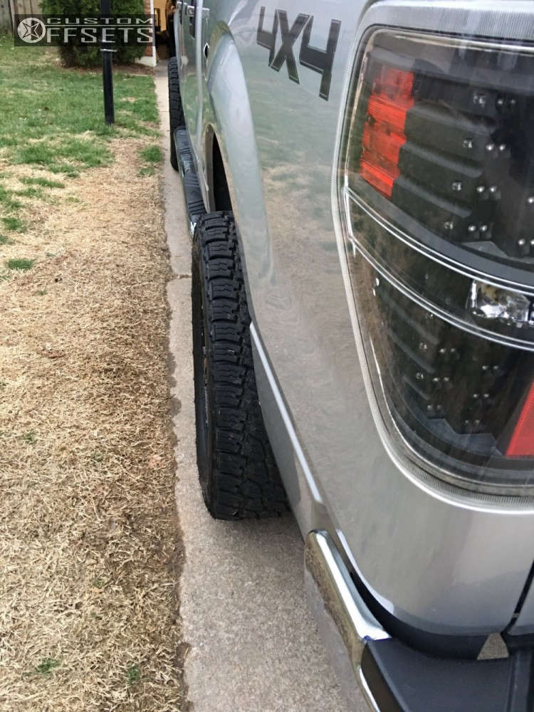 2012 Ford F150 with 20x9 12 Ballistic Mace and 305/55R20 Nitto Terra