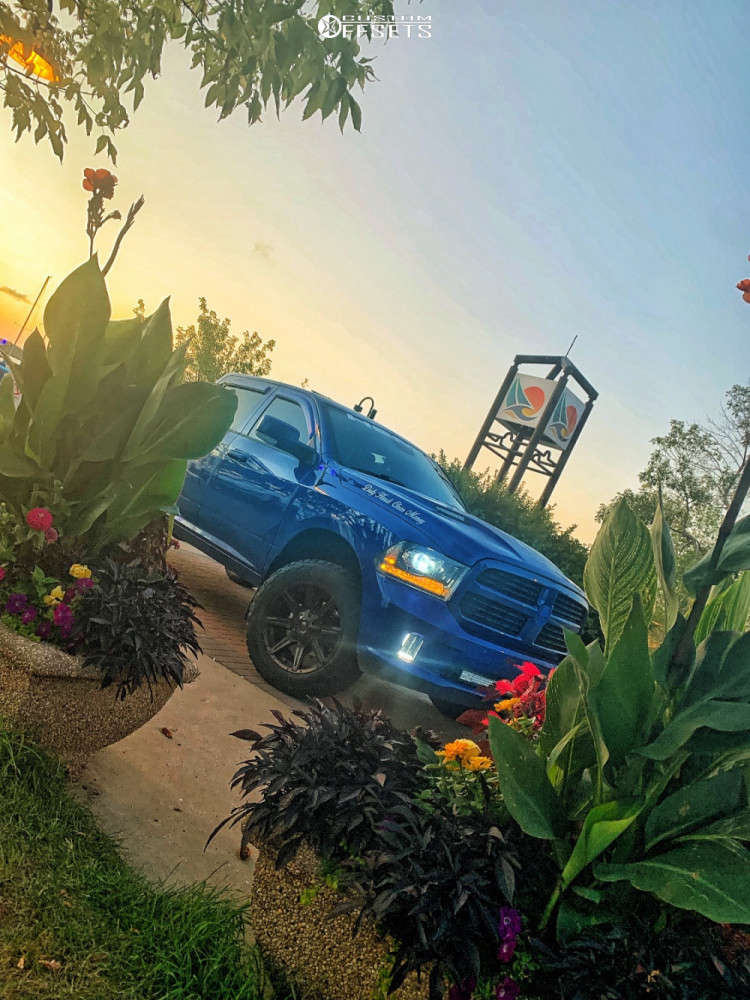 2014 Ram 1500 with 20x12 -44 Black Iron Ranger and 33/12.5R20 ...