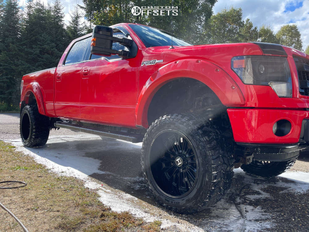2014 Ford F150 with 22x12 44 Hostile Fury and 325/50R22 Cooper