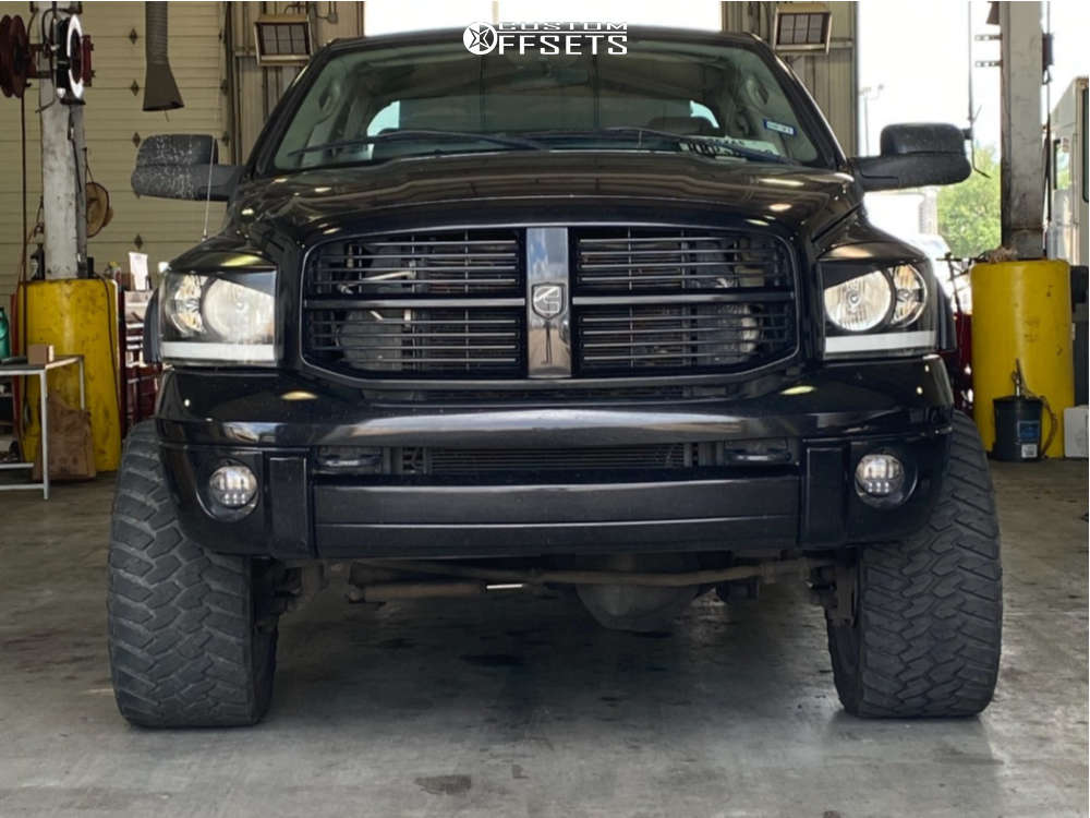 2006 Dodge Ram 2500 with 22x12 44 Monster Offroad M17 and 355/40R22