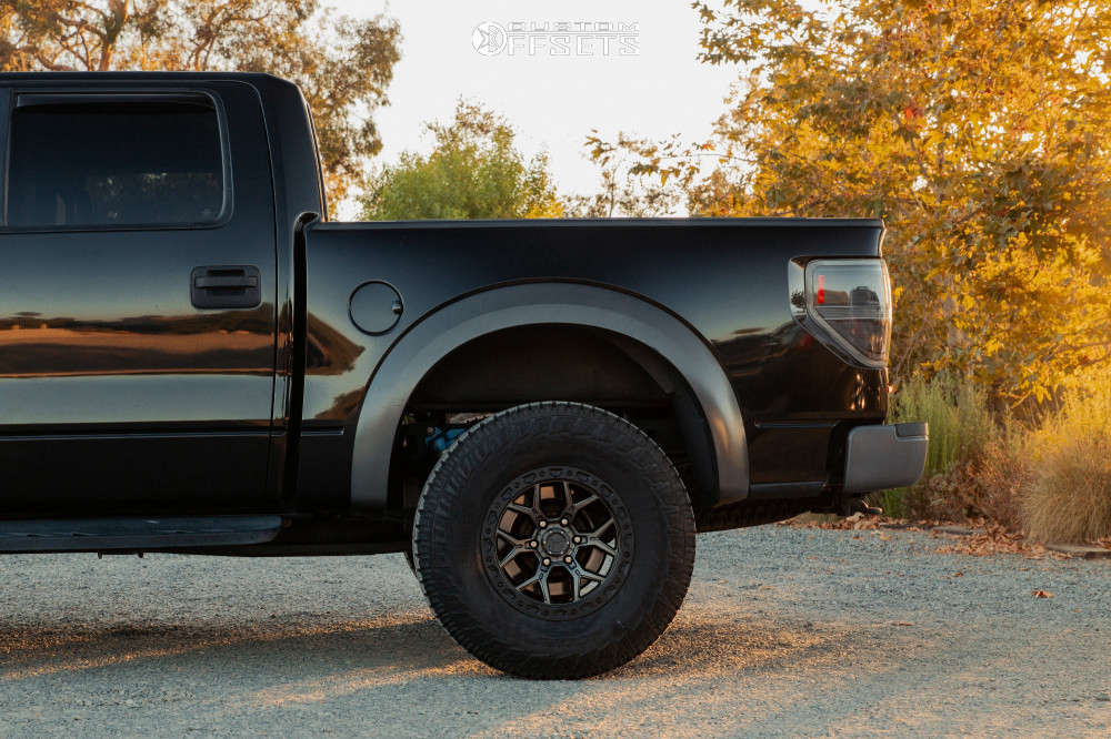 2013 Ford Raptor with 17x9 VenomRex Vr601bl and 315/70R17 Pirelli ...