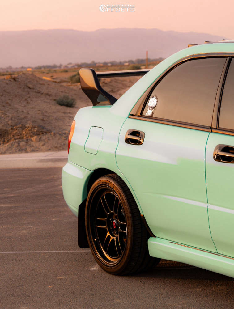 2003 Subaru Impreza with 18x9.5 38 Enkei Rpf1 and 255/35R18 Falken ...