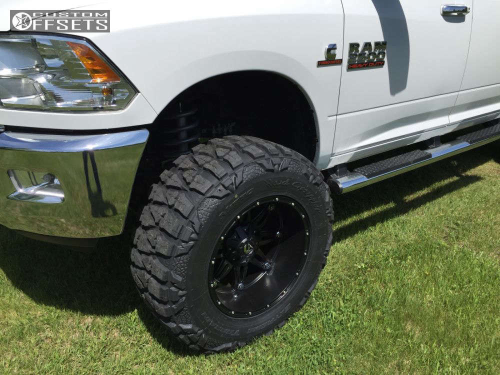 2013 Ram 2500 with 20x12 44 Fuel Hostage and 37/13.5R20 Nitto Mud