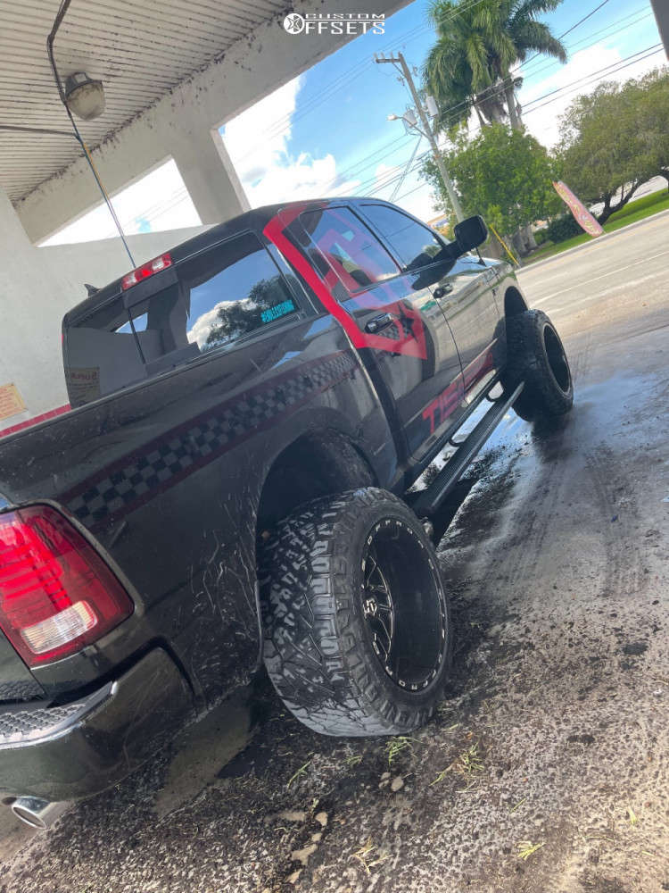 2018 Ram 1500 with 22x14 -76 TIS 544BM and 325/50R22 Nitto Ridge ...