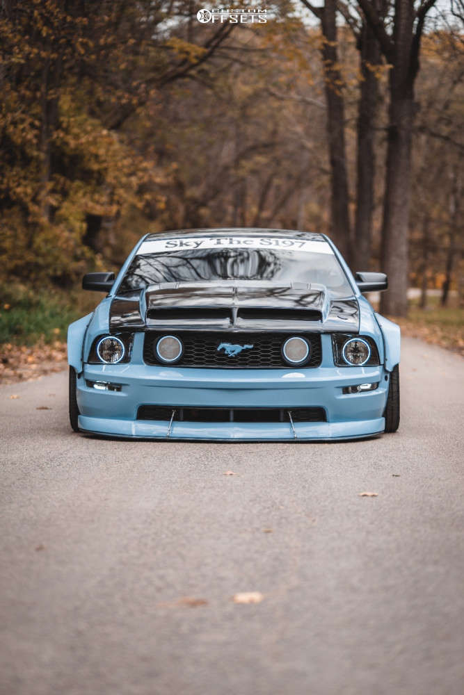 2006 Ford Mustang with 18x10 11 MST Suzuka and 295/35R18