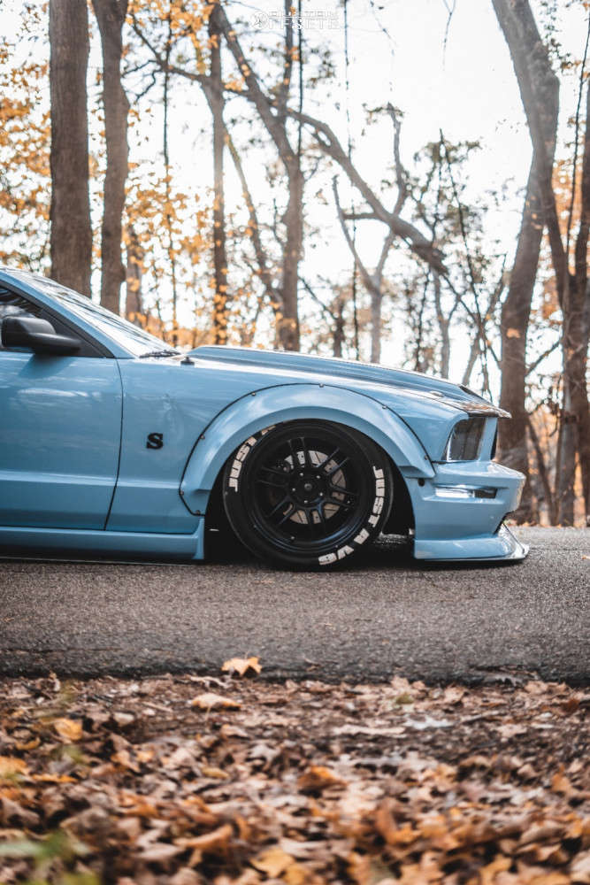 2006 Ford Mustang with 18x10 11 MST Suzuka and 295/35R18