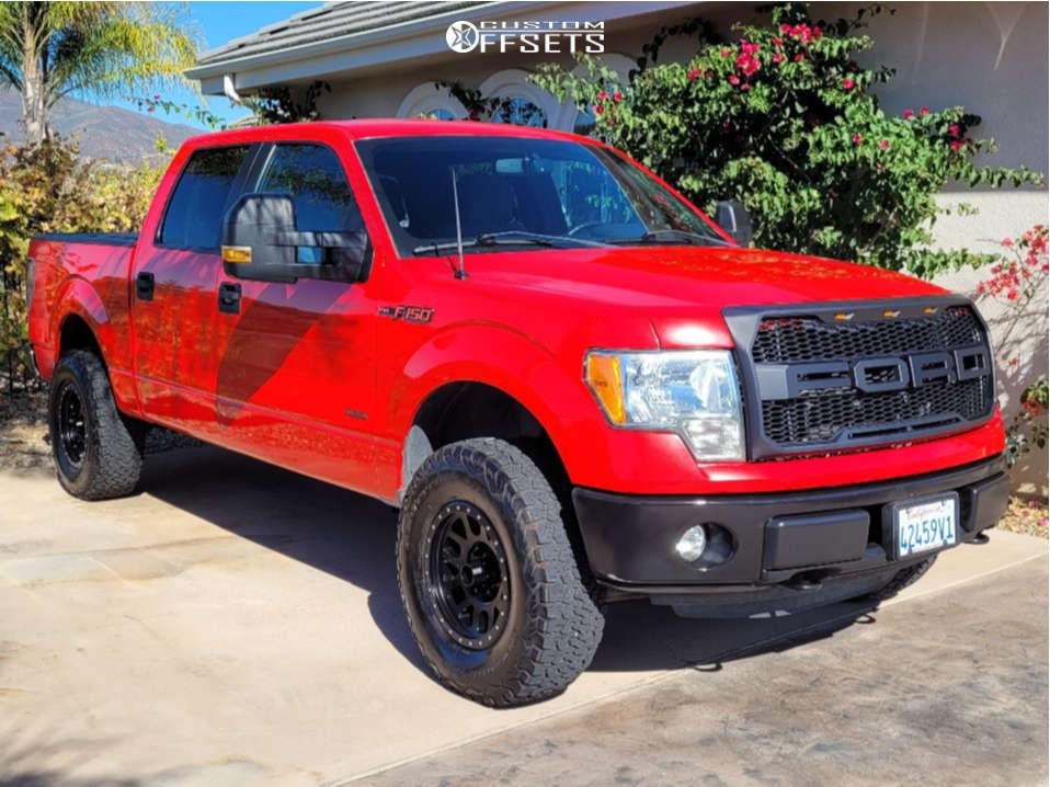 2014 Ford F150 with 18x9 4 Method Grid and 32/10.5R18 BFGoodrich Tire