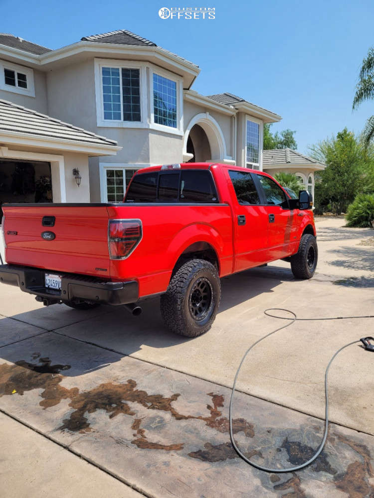 2014 Ford F150 with 18x9 4 Method Grid and 32/10.5R18 BFGoodrich Tire