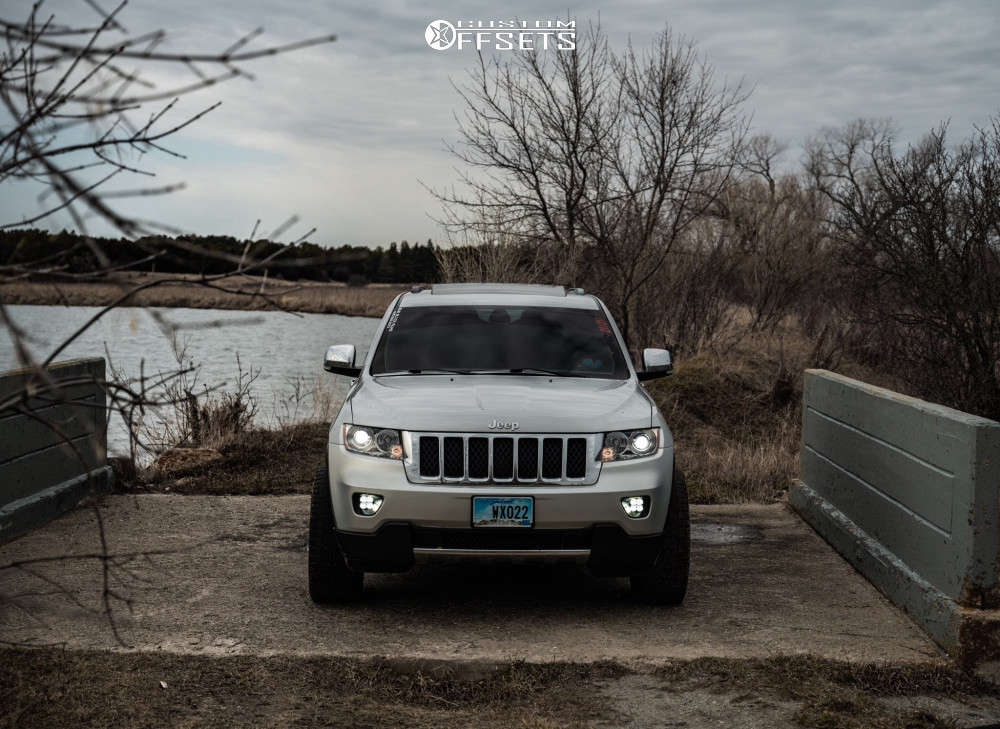 2011 Jeep Grand Cherokee with 20x9 12 Fuel Contra and 265/50R20 Falken ...