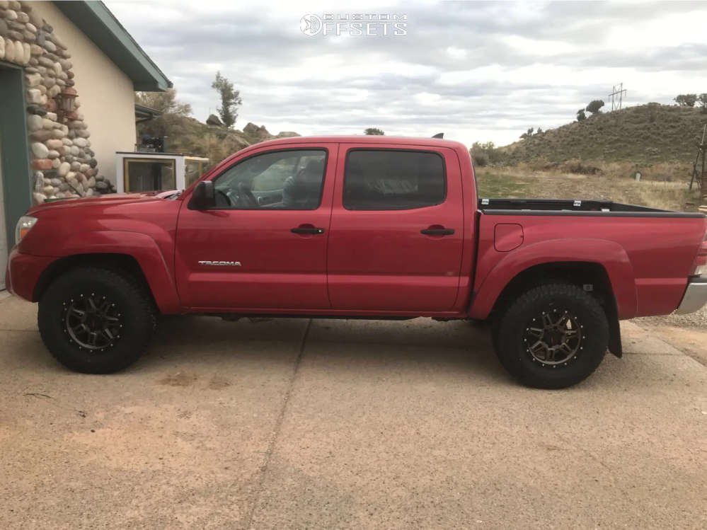 2015 Toyota Tacoma with 16x8 -6 DX4 Rebel and 265/75R16 Falken