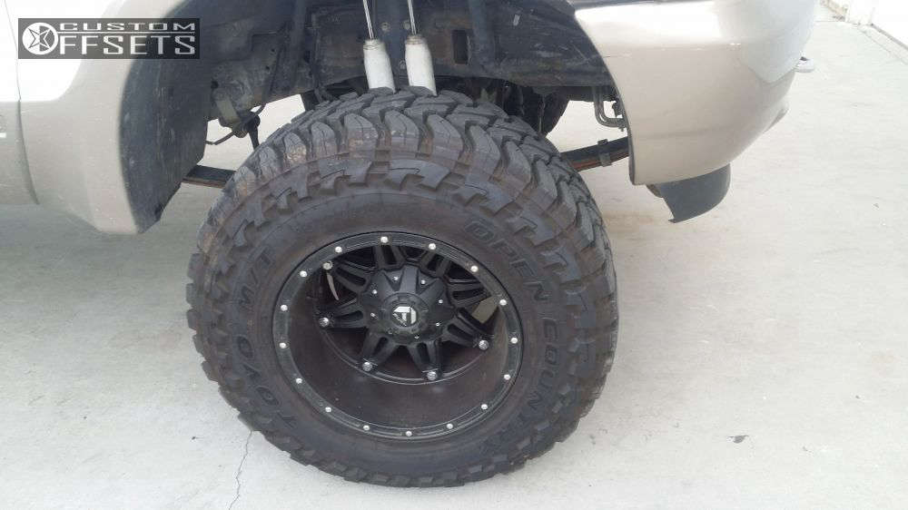 2004 Ford Excursion with 18x12 -44 Fuel Hostage and 35/12.5R18 Toyo ...
