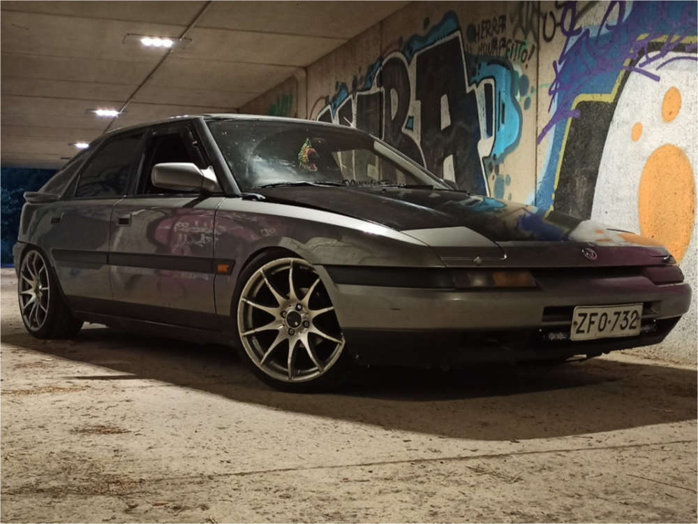 1993 Mazda 323 with 17x8 35 Tomason Tn1 and 195/45R17 Nankang As-1
