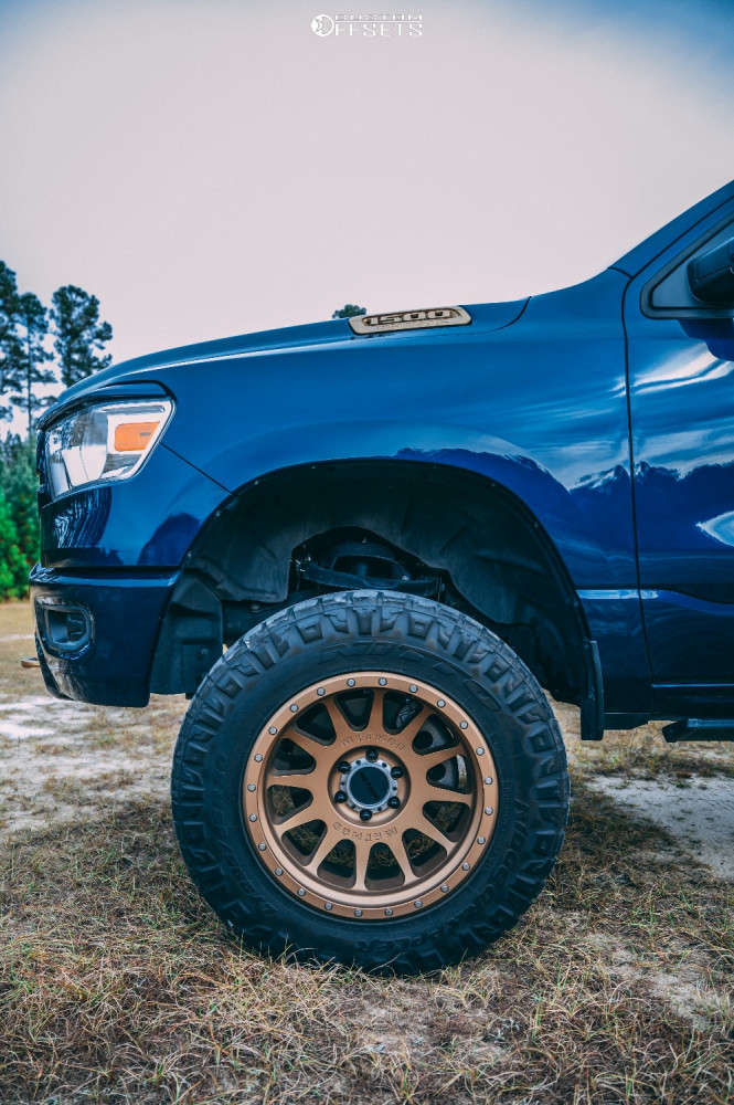 2020 Ram 1500 with 20x10 -24 Method Mr605 and 295/65R20 Nitto Ridge ...