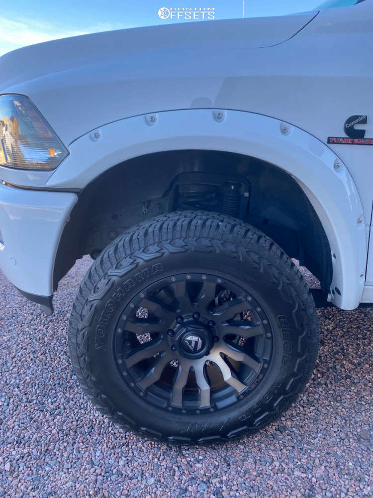 2018 Ram 2500 with 20x9 1 Fuel Blitz and 295/65R20 Yokohama Geolandar