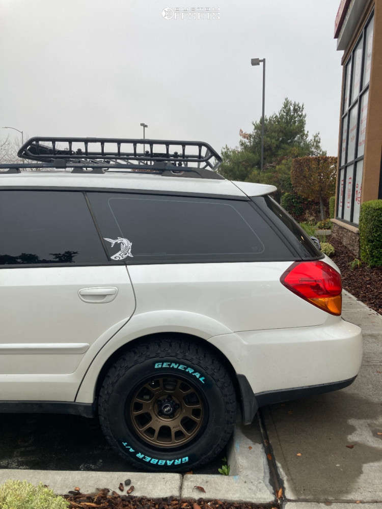 2006 Subaru Outback with 15x7 15 RRW RR5S and 215/75R15 General