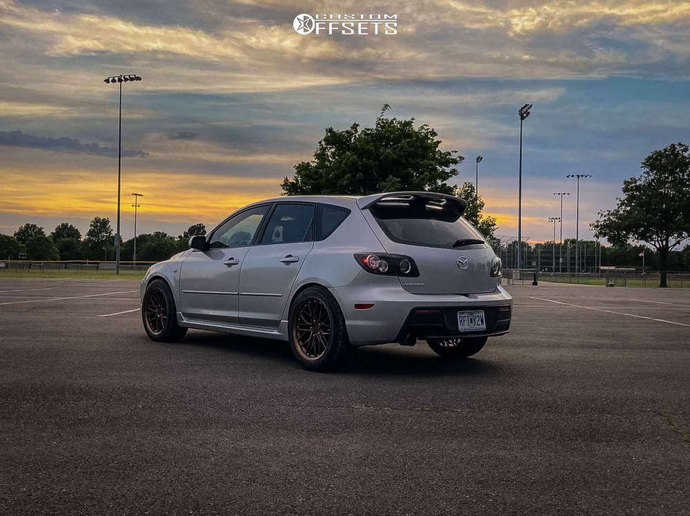 2007 Mazda 3 with 18x8.5 35 XXR 571 and 245/45R18 Achilles Atr