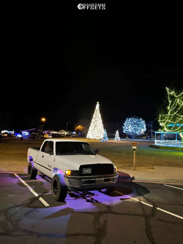 1998 Dodge Ram 1500 with 17x9.5 9 Pro Comp Series 45 and 33/9.5R17 Pro ...