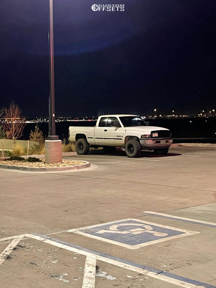 1998 Dodge Ram 1500 with 17x9.5 9 Pro Comp Series 45 and 33/9.5R17 Pro ...
