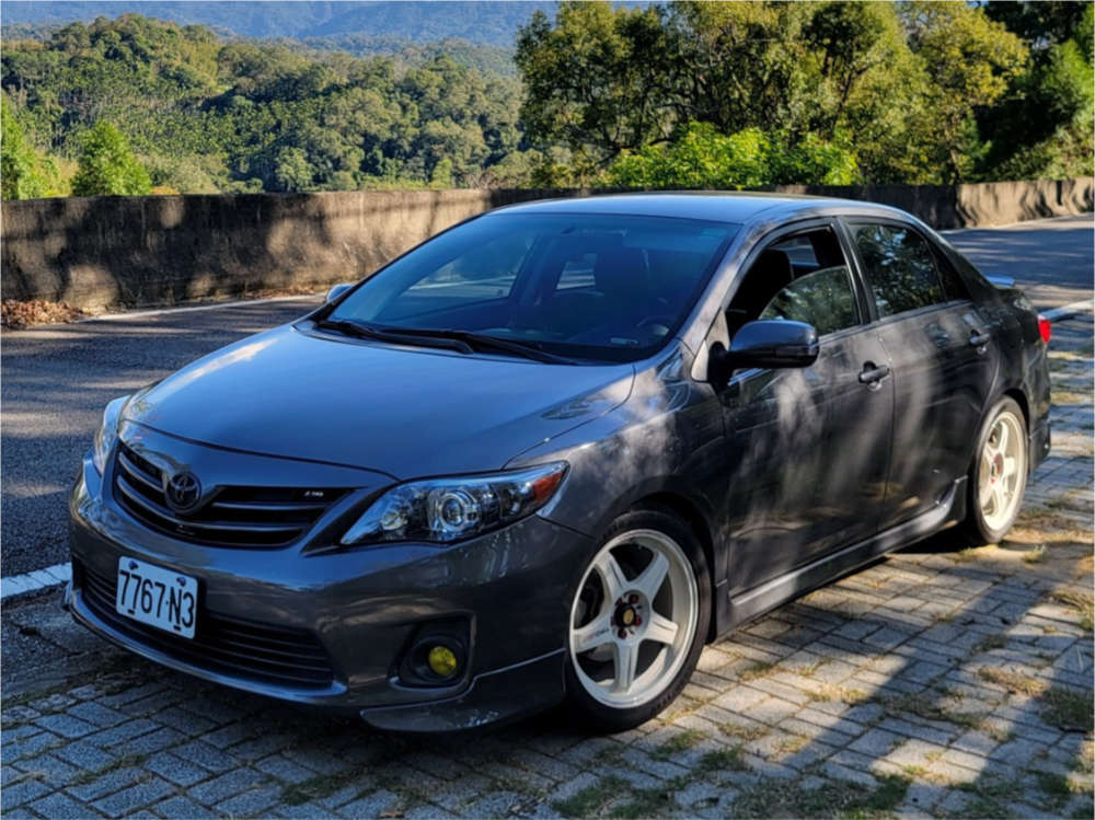 2011 Toyota Corolla with 17x7.5 30 Rays Engineering Trd T3 and 225 