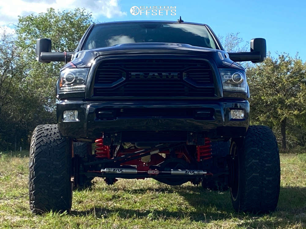 2018 Ram 2500 with 24x16 101 Fuel Ff01 and 38/13.5R24 Nitto
