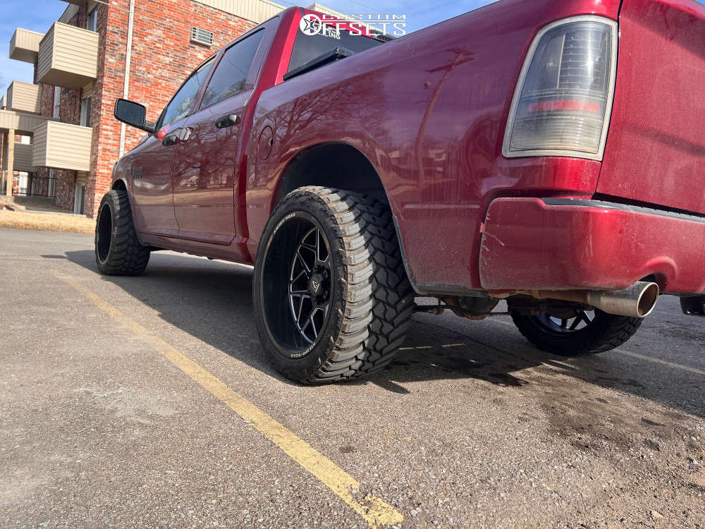 2014 Ram 1500 with 22x12 44 Axe Offroad Nemesis and 33/12.5R22 AMP Mud