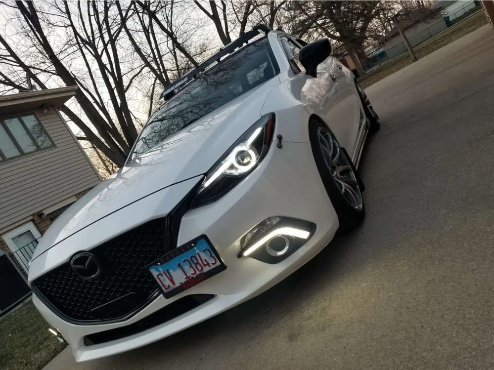 2014 Mazda 3 with 18x8.5 35 Vors Tr4 and 225/40R18 Yokohama Advan