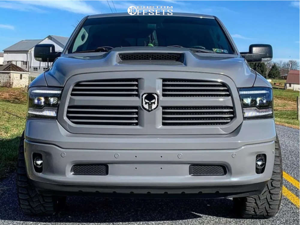 2015 Ram 1500 with 20x12 44 TIS 553BM and 33/12.5R20 Toyo Tires Open