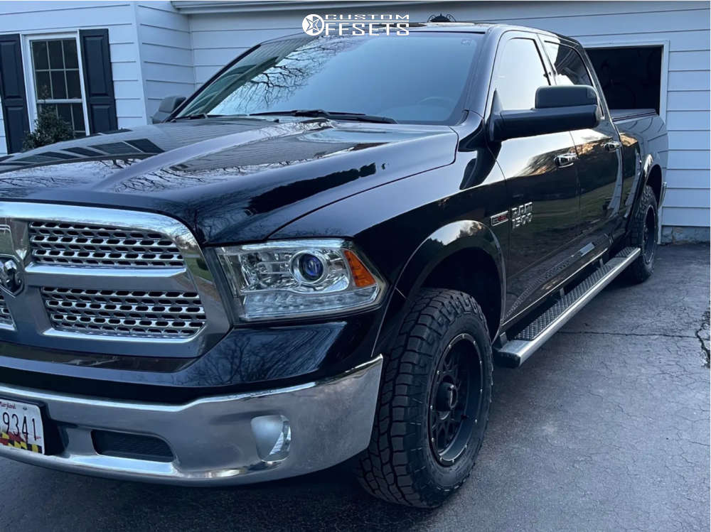 2016 Ram 1500 with 18x9 12 Vision Rocker and 265/70R18 Cooper ...