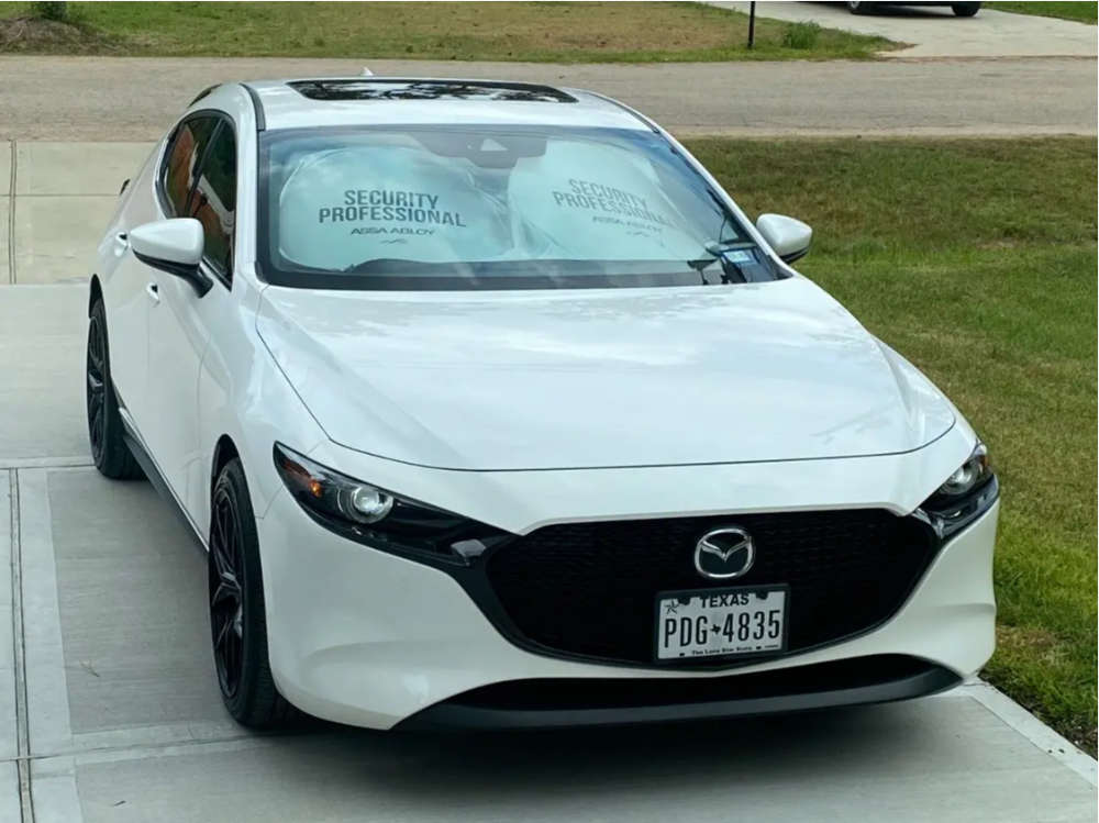 2021 Mazda 3 with 18x8.5 38 Enkei Tsr-x and 215/45R18 Bridgestone