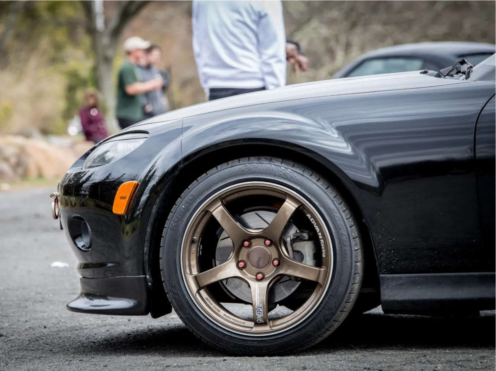 2006 Mazda MX-5 Miata with 17x8 45 Advan Racing TC4 and 215/45R17