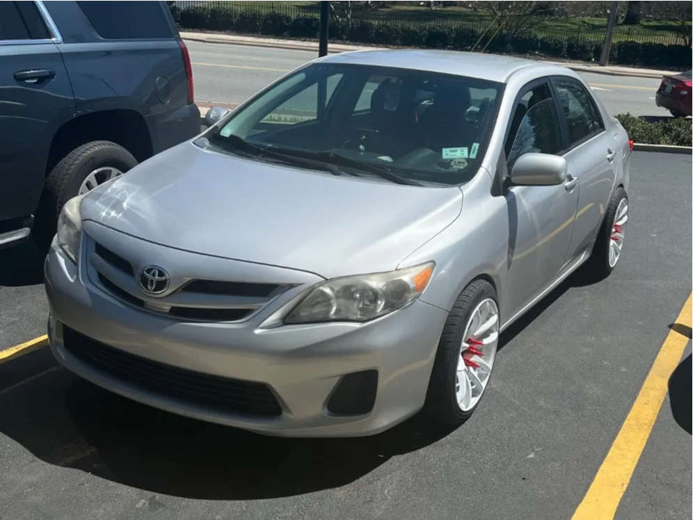 2011 Toyota Corolla with 17x9 30 Vors Tr4 and 235/45R17 Vercelli