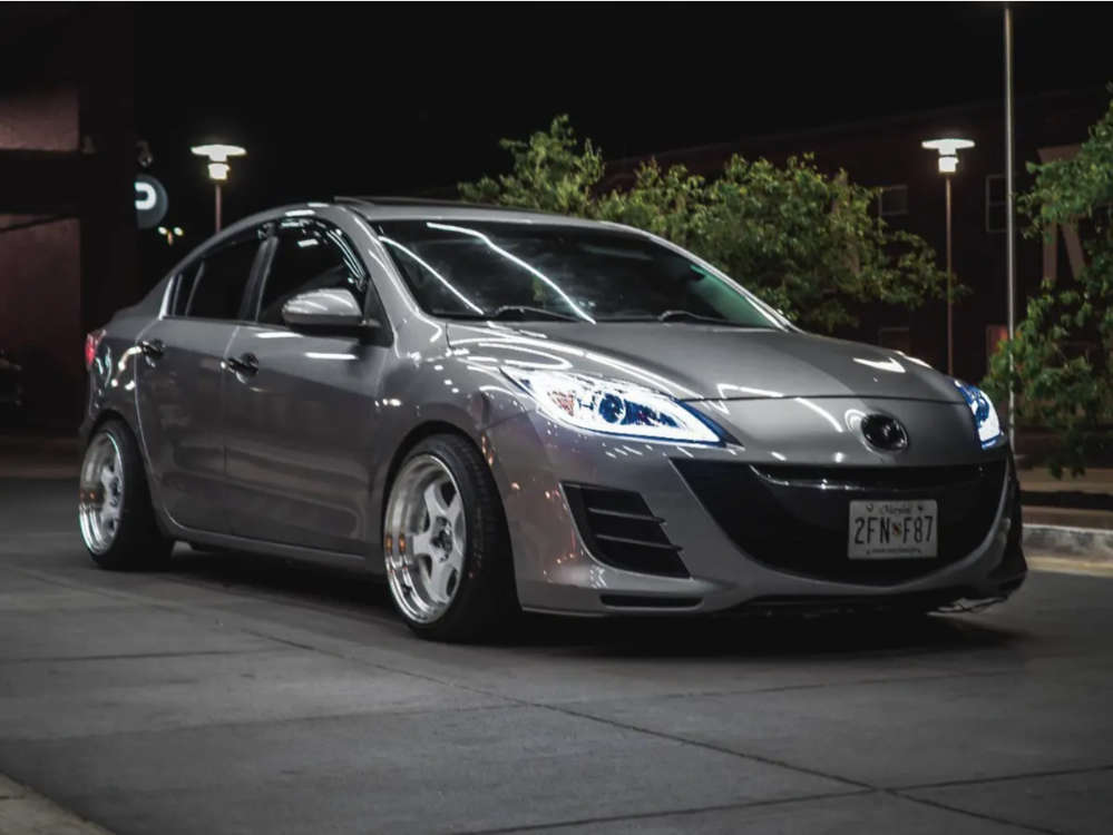 2010 Mazda 3 with 17x9 20 MST Mt07 and 215/40R17 Nexen Nfera Su1