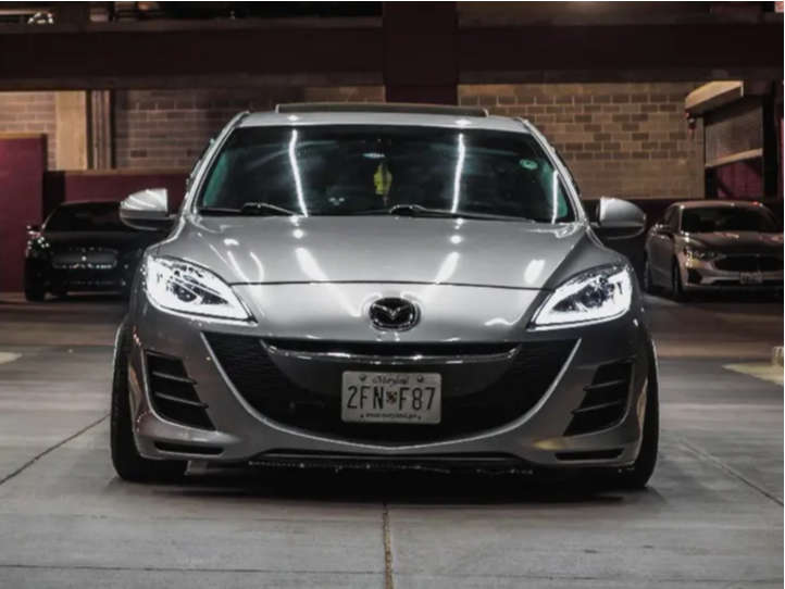 2010 Mazda 3 with 17x9 20 MST Mt07 and 215/40R17 Nexen Nfera Su1