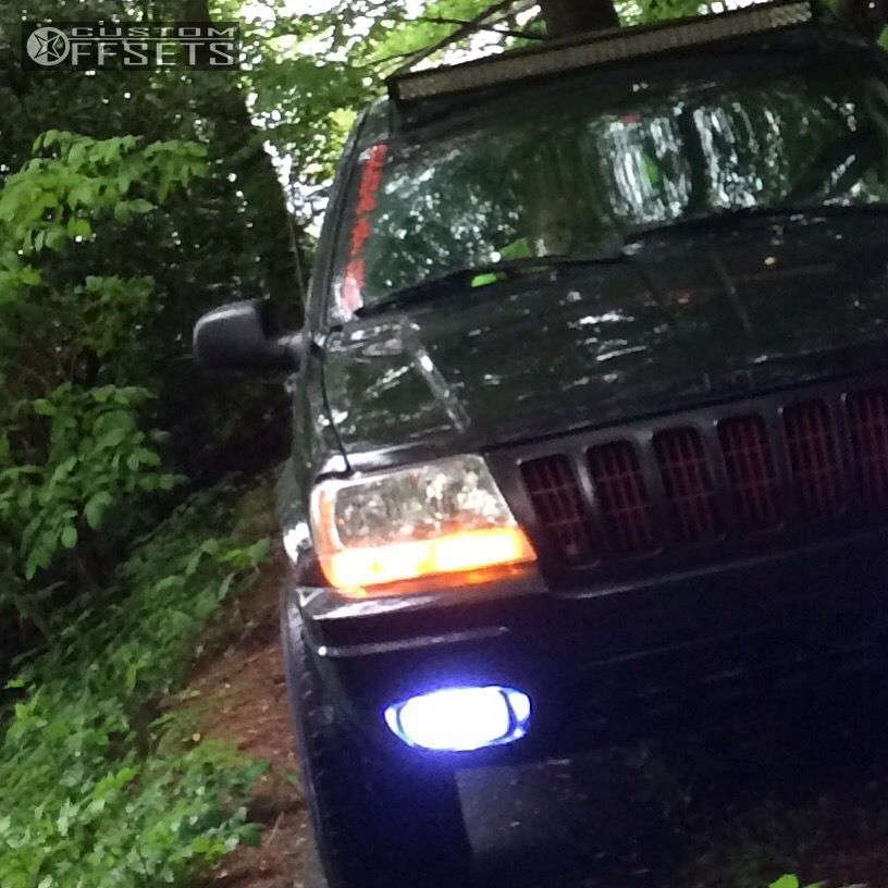 2002 Jeep Grand Cherokee with 17x9 18 Gear OffRoad Black Jack and 30/9