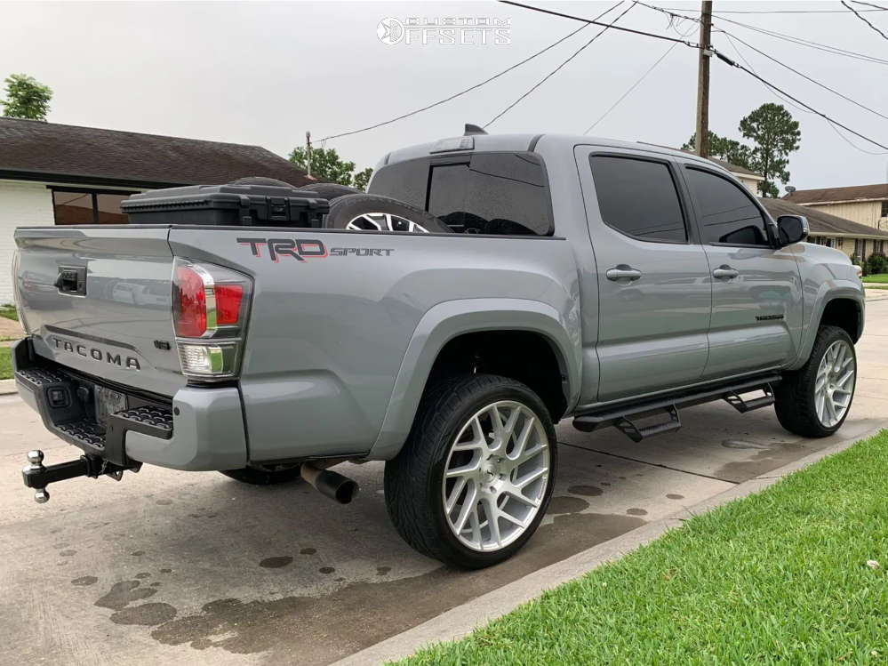 2020 Toyota Tacoma with 22x9.5 15 Status Juggernaut and 265/40R22 Toyo ...