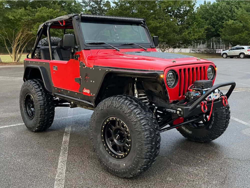 1997 Jeep Wrangler with 17x8.5 0 Vision Manx and 37/12.5R17
