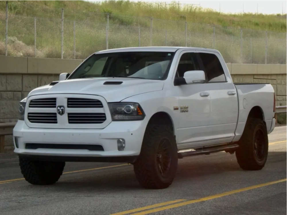 2014 Ram 1500 with 20x10 25 Motiv Offroad Mutant and 35/12.5R20